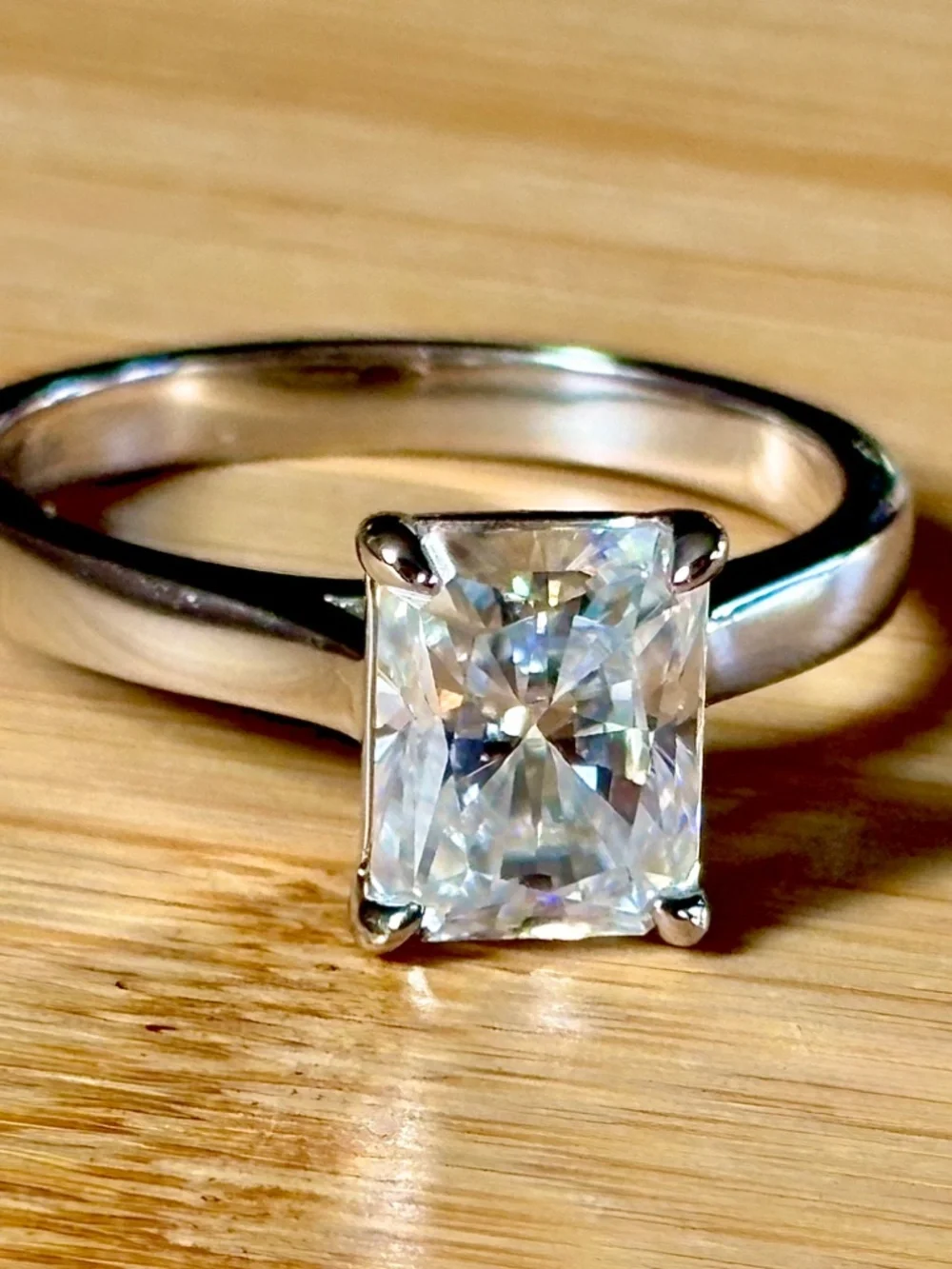 A certified 3ct radiant Moissanite solitaire in solid sterling silver and 18k!